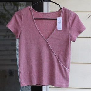 Light red wrap style top